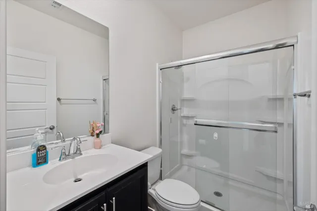 a kitchen with counter top space cabinets and stainless steel appliances