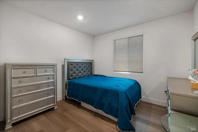 a kitchen with stainless steel appliances granite countertop a stove and a microwave