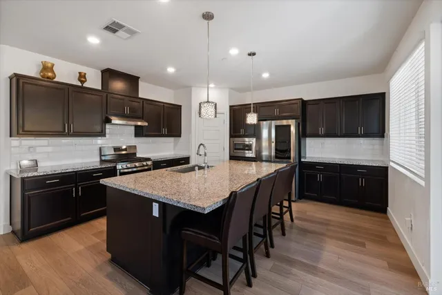 a living room with furniture and a couch