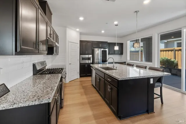 a bed room with a bed and a chair