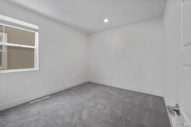 a bathroom with a tub a sink and a shower