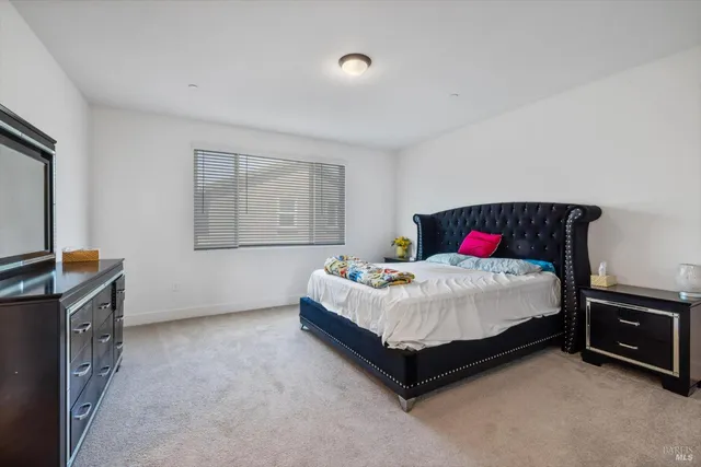 a view of a chairs and table in a patio