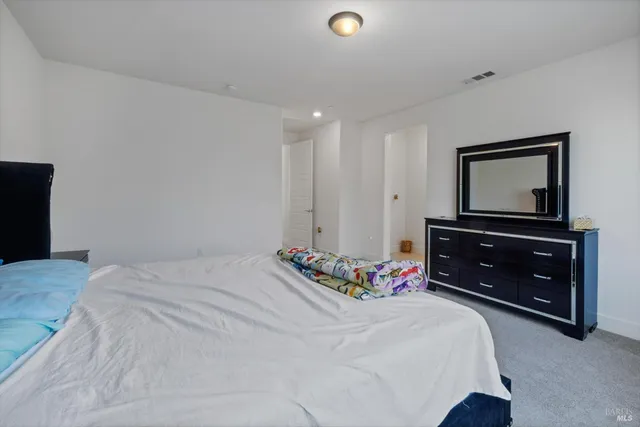 a view of a hallway with furniture and in living room