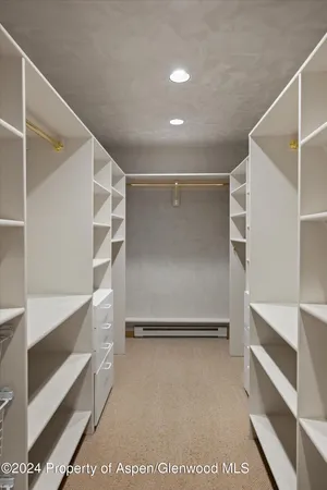 a view of an empty walk in closet