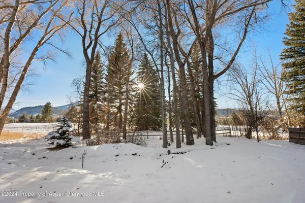 a view of staircase and door