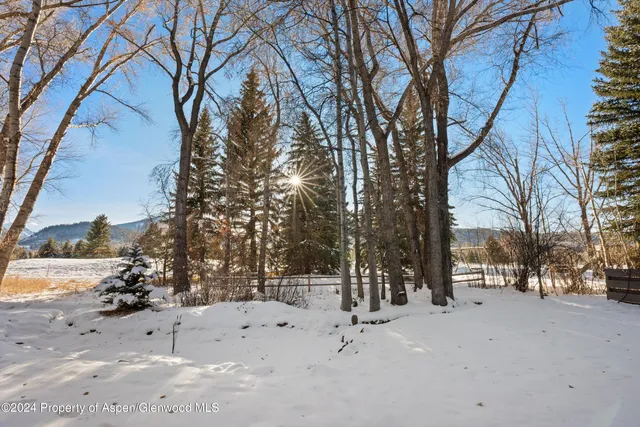 a view of staircase and door