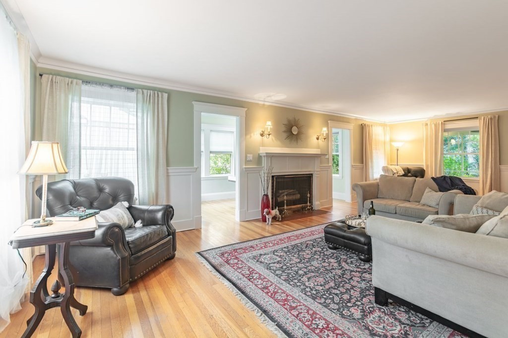 72 Shepherd Road Medford, MA 02155 - Photo 8 of 21 a living room with furniture and a fireplace