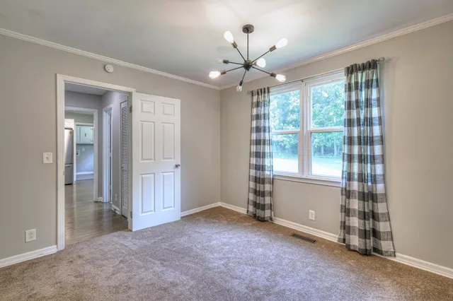 wooden floor and windows in an empty room