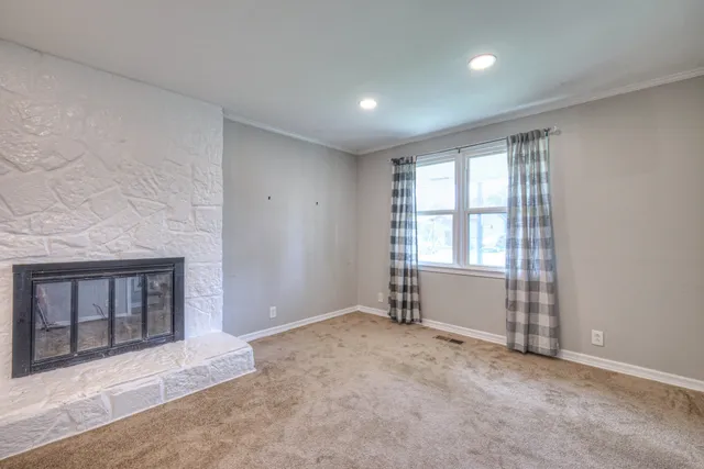 an empty room with windows