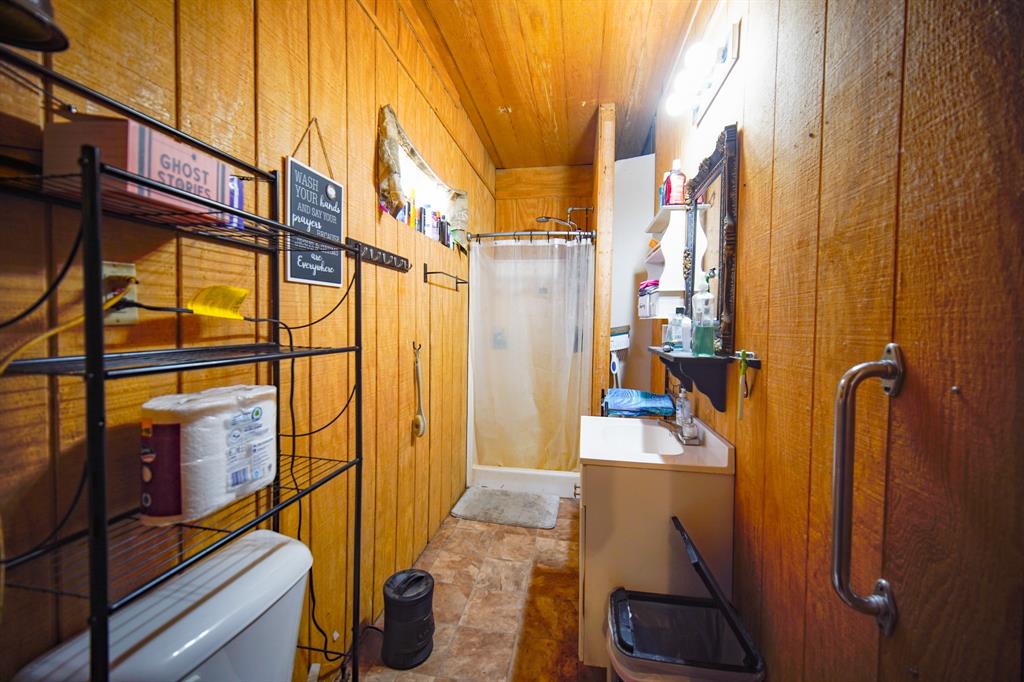 334 Cook Road Jacksboro, TX 76458 - Photo 6 of 20 a view of a porch with wooden floor and furniture