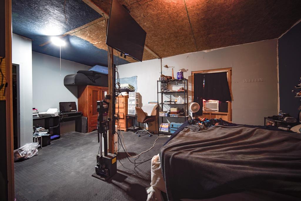 334 Cook Road Jacksboro, TX 76458 - Photo 7 of 20 a view of a room with gym equipment