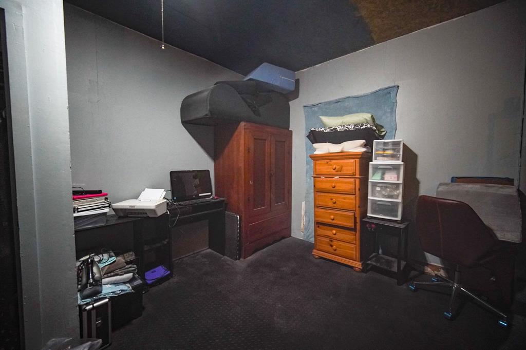 334 Cook Road Jacksboro, TX 76458 - Photo 8 of 20 a living room with furniture and a flat tv screen on dresser