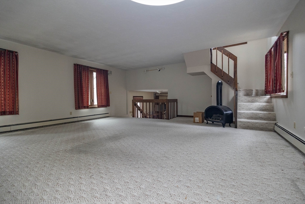 10 Nancy Road Natick, MA 01760 - Photo 14 of 19 a view of a livingroom with entryway furniture and windows