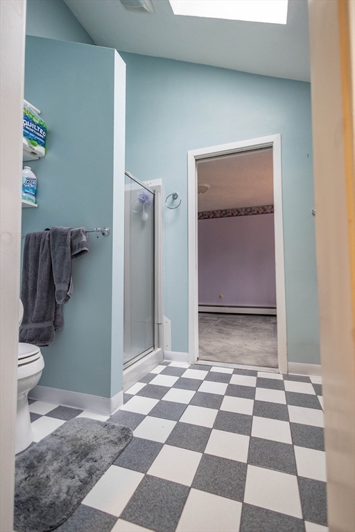 10 Nancy Road Natick, MA 01760 - Photo 8 of 19 a view of a bathroom with a black and white checkered floor