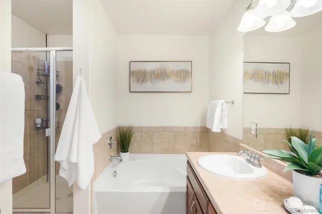 a bathroom with a bathtub and a sink