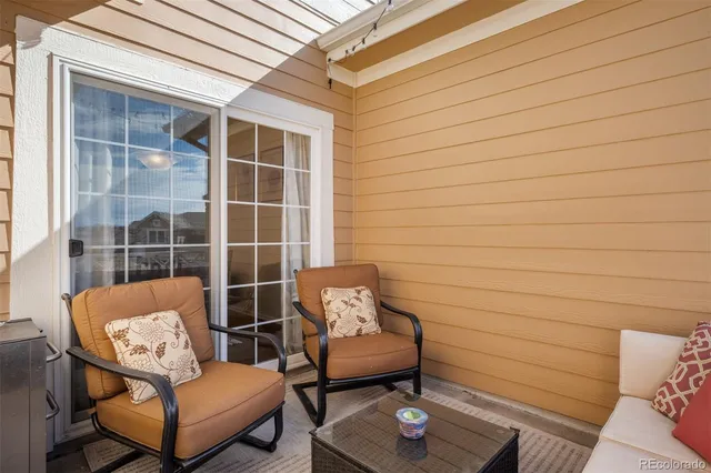 a outdoor living space with furniture and a window