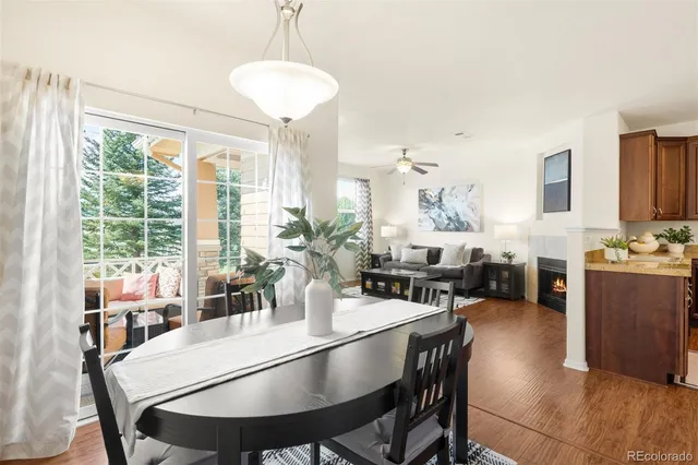 a view of a dining room with furniture window and outside view