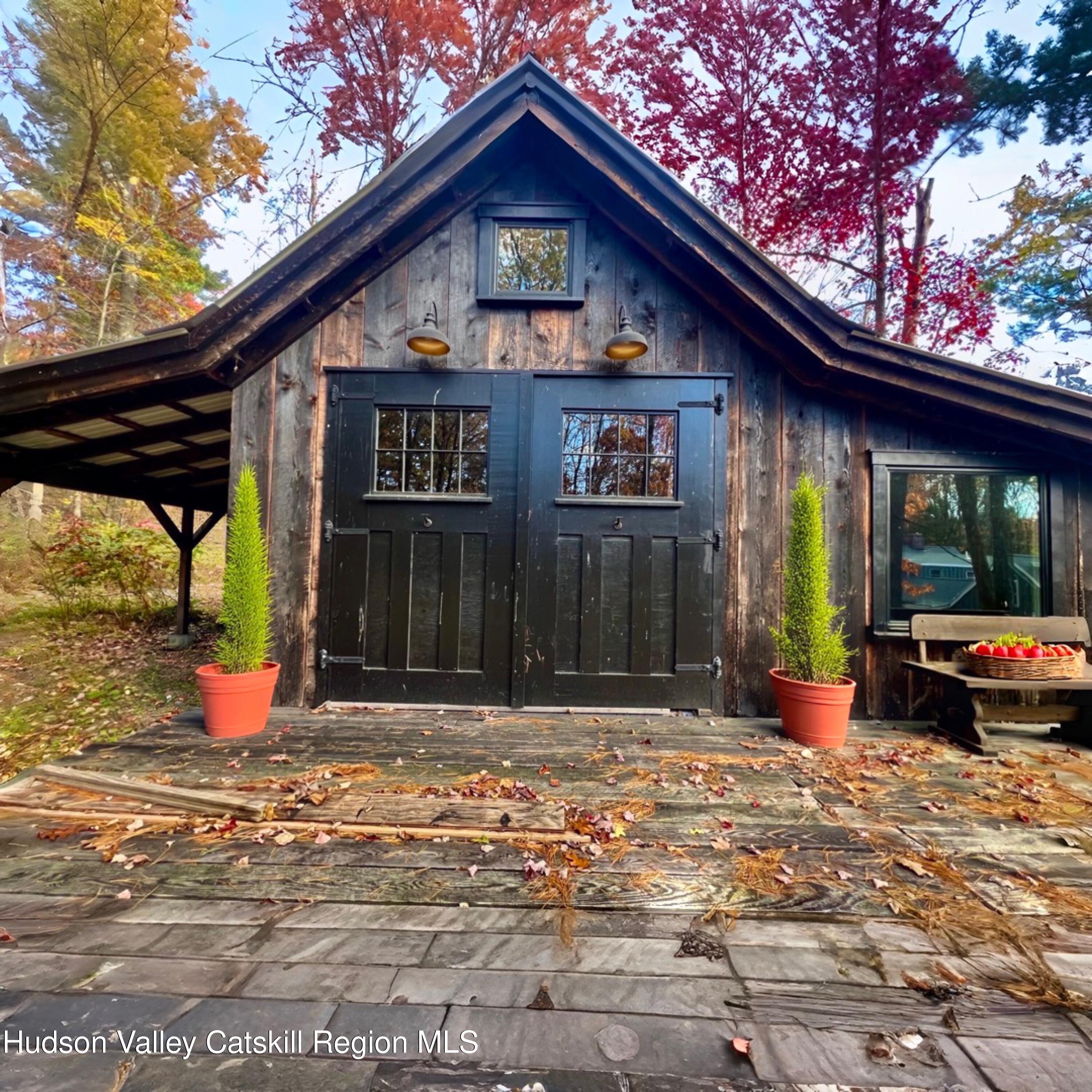 40 Engel Road Old Chatham, NY 12136 - Photo 26 of 37 a front view of a house with porch