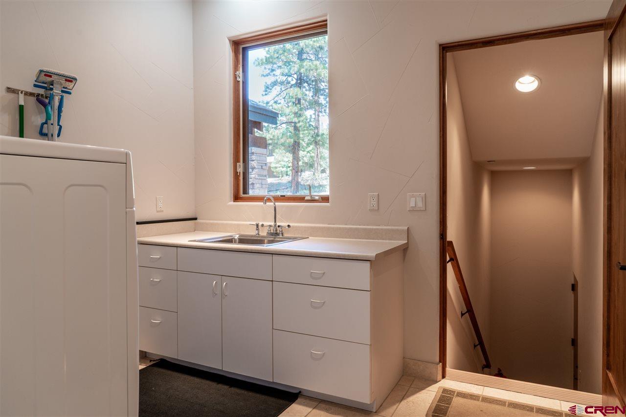 258 Goulding Creek Road Durango, CO 81301 - Photo 27 of 35 a bathroom with a sink and a mirror