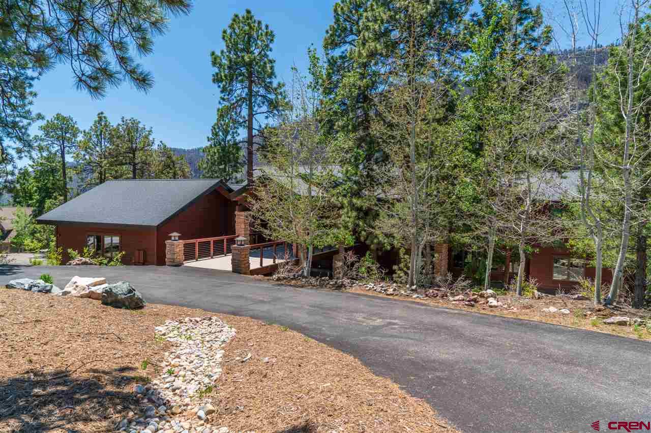 258 Goulding Creek Road Durango, CO 81301 - Photo 33 of 35 a view of a house with a snow in the yard