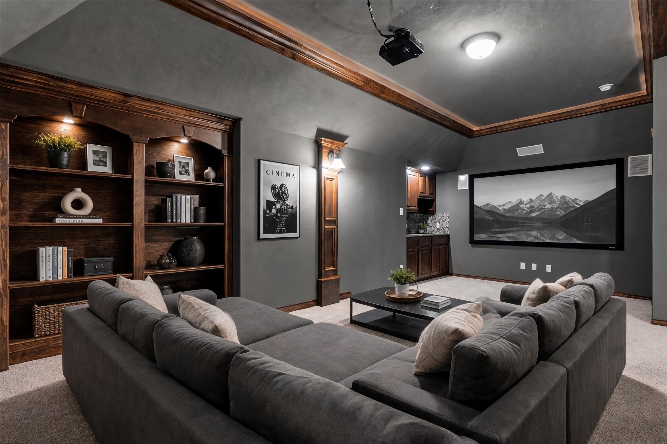 2115 Graystone Ridge Drive Conroe, TX 77304 - Photo 30 of 47 Enjoy your private movie room, a dedicated theater-style space designed for an immersive viewing experience.