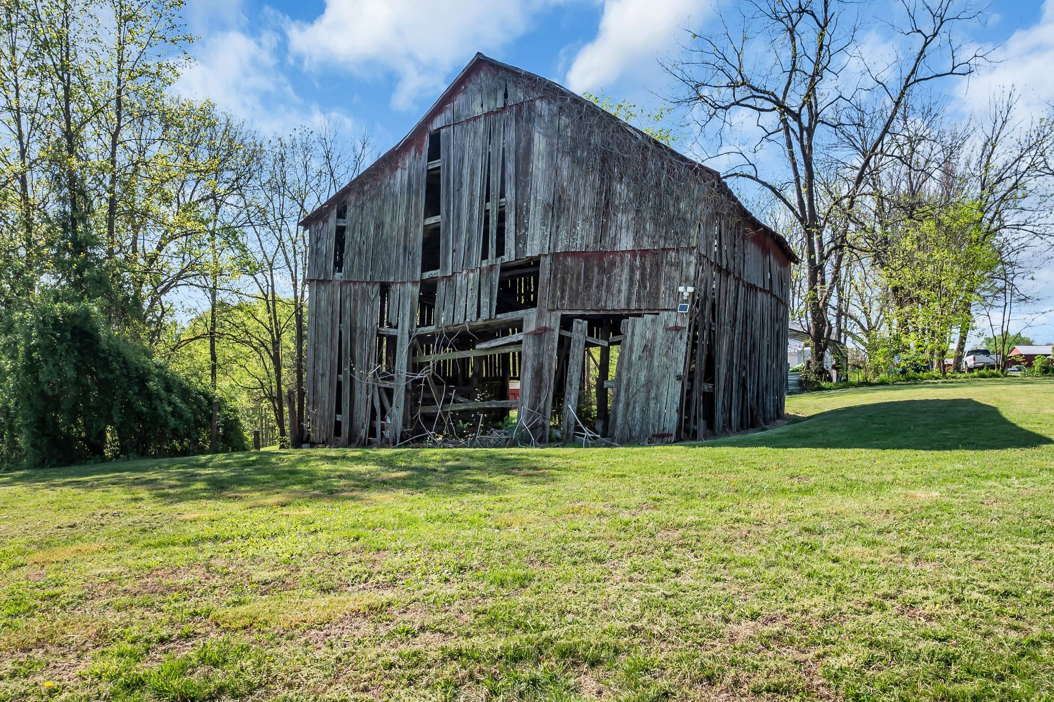 4241 Tanyard Hill Road Lynchburg, TN 37352 - Photo 36 of 50 a view of a house with a yard