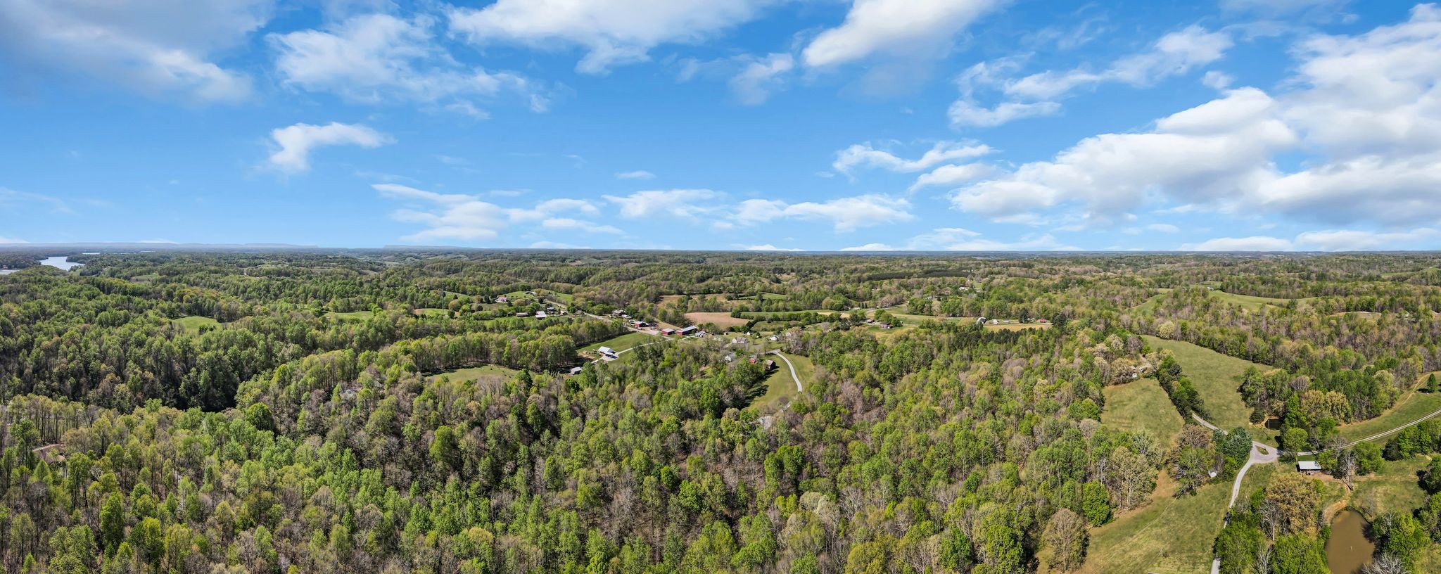 4241 Tanyard Hill Road Lynchburg, TN 37352 - Photo 50 of 50 a view of a city with lush green forest