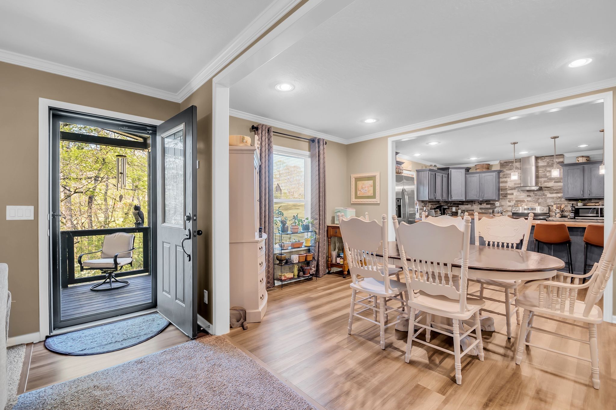 4241 Tanyard Hill Road Lynchburg, TN 37352 - Photo 6 of 50 a view of a dining room with furniture and floor to ceiling window