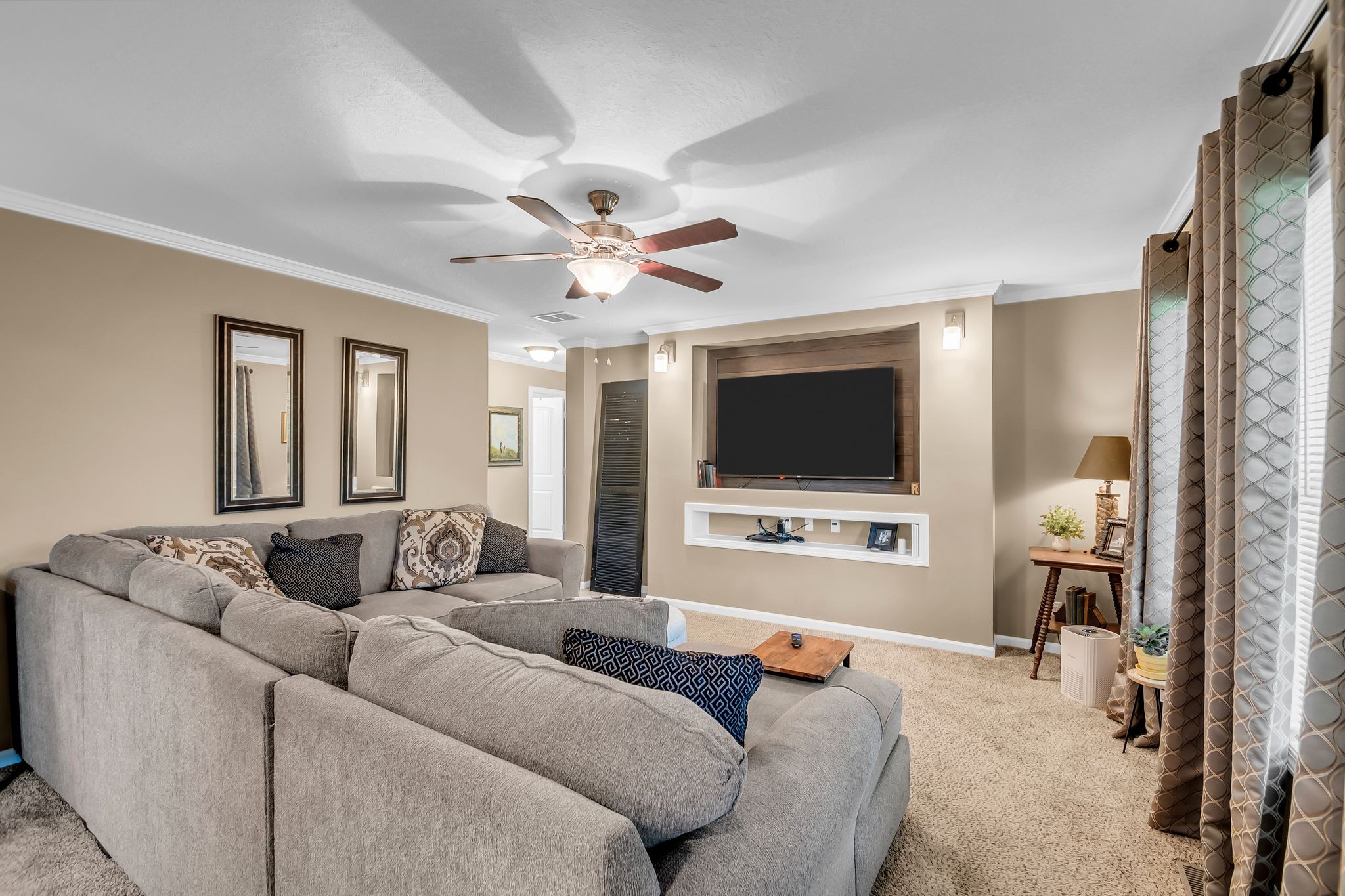 4241 Tanyard Hill Road Lynchburg, TN 37352 - Photo 8 of 50 a living room with furniture and a flat screen tv