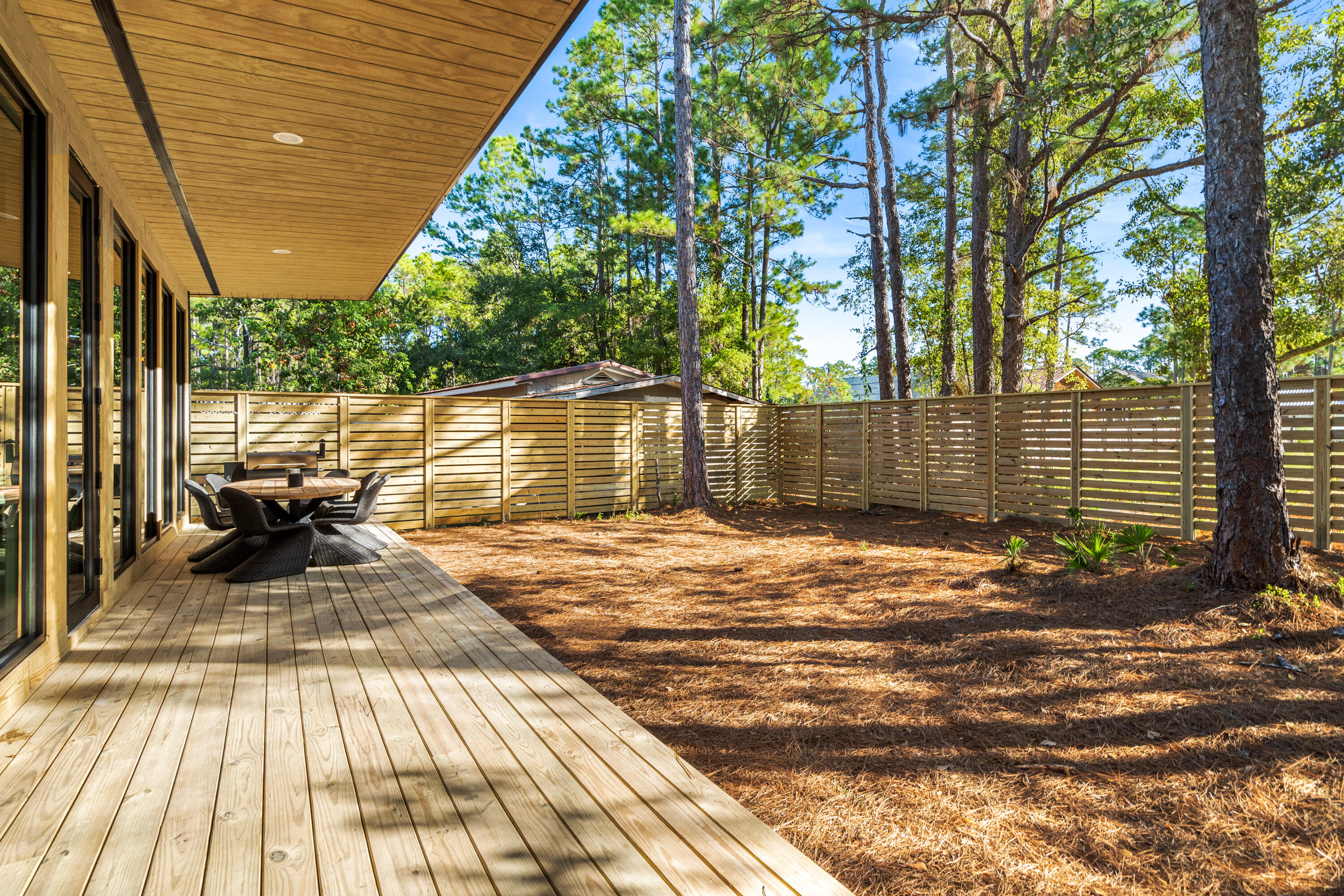 96 South 2nd Street Santa Rosa Beach, FL 32459 - Photo 5 of 25 a view of a backyard with a patio