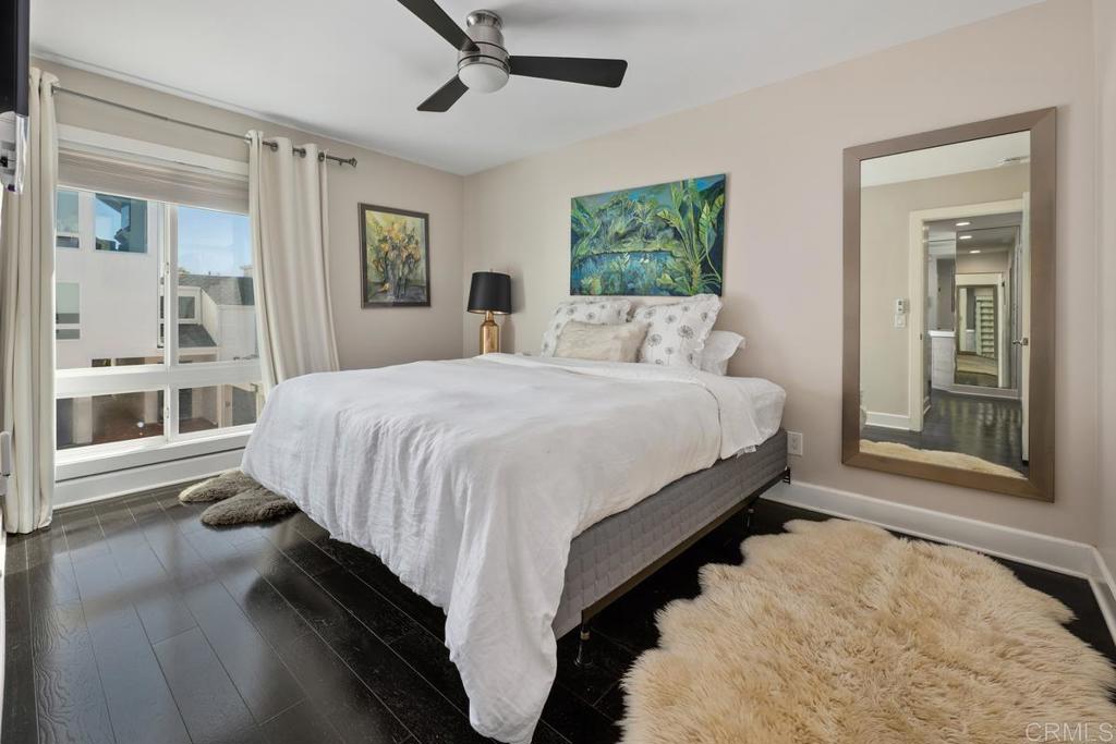 328 Shoemaker Court Solana Beach, CA 92075 - Photo 11 of 19 a bedroom with a large bed and a window