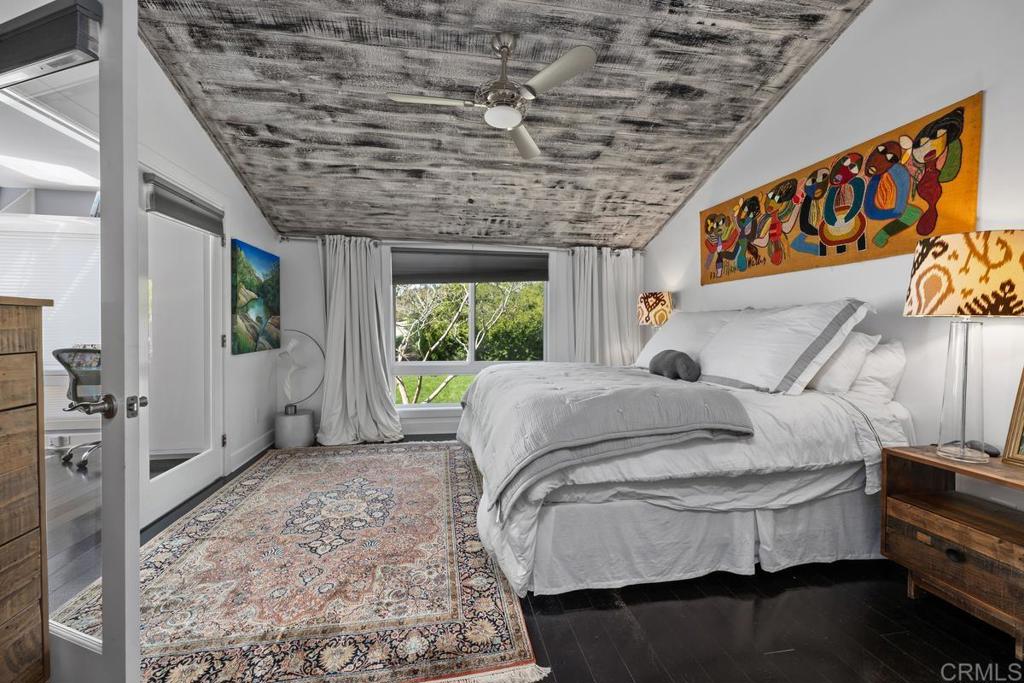328 Shoemaker Court Solana Beach, CA 92075 - Photo 15 of 19 a bed sitting in a room next to a window