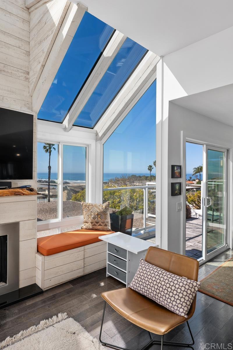 328 Shoemaker Court Solana Beach, CA 92075 - Photo 5 of 19 a living room with furniture and a table