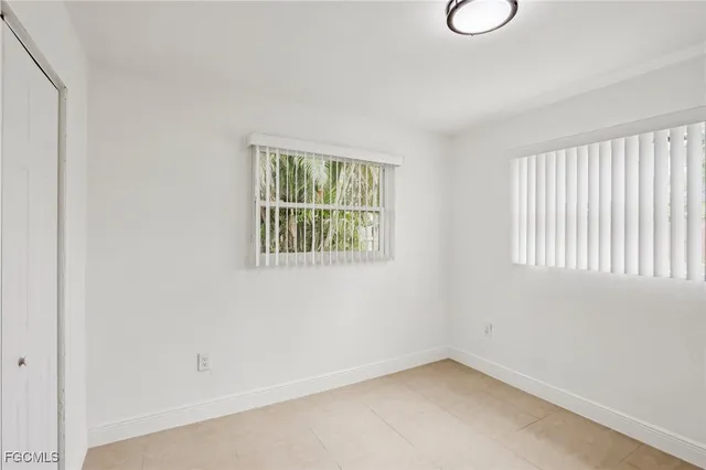 an empty room with windows