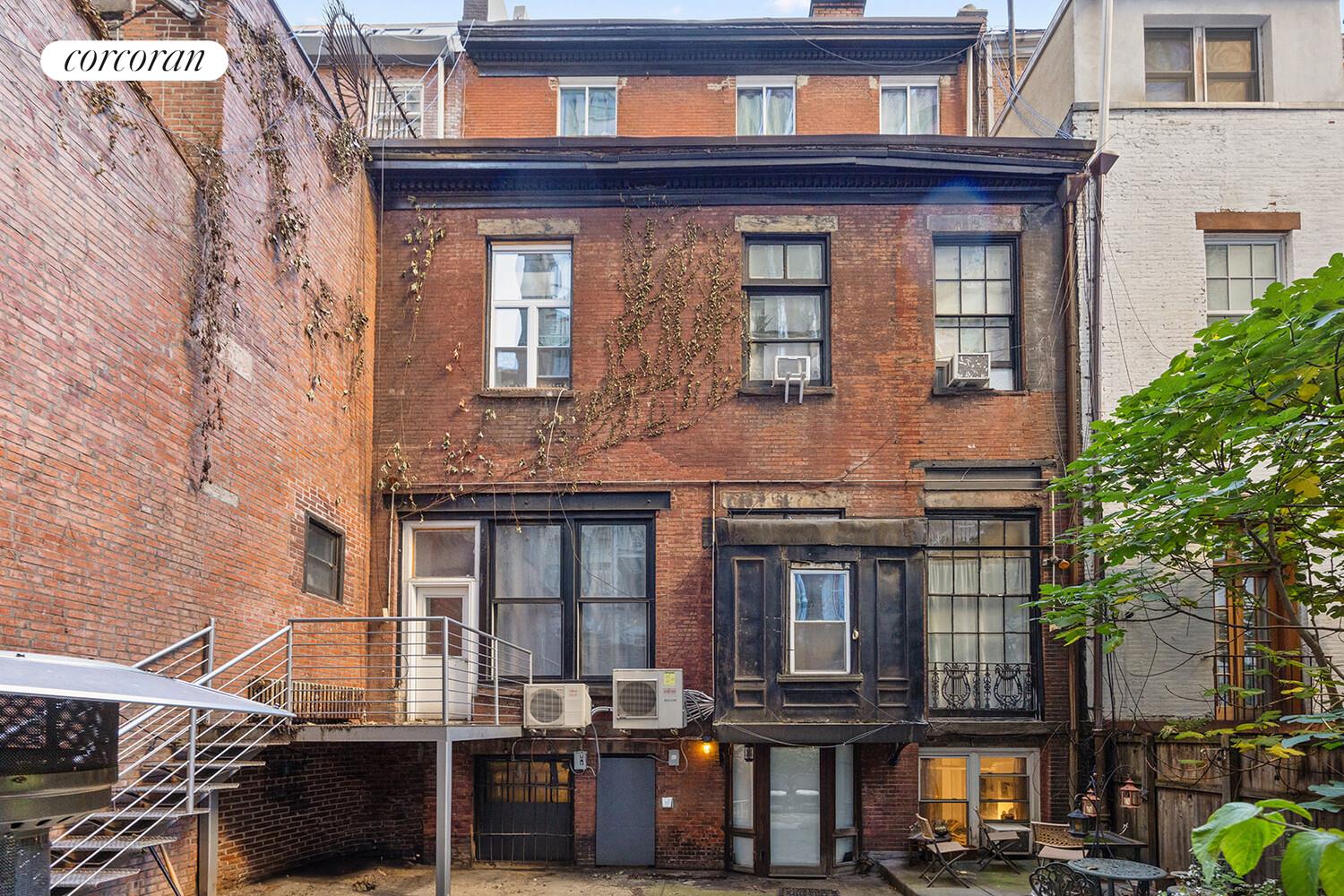 7 West 16th Street Manhattan, NY 10011 - Photo 18 of 21 a building view with a lot of windows