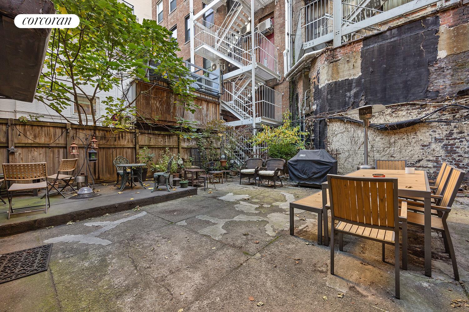 7 West 16th Street Manhattan, NY 10011 - Photo 19 of 21 a view of a street with sitting area