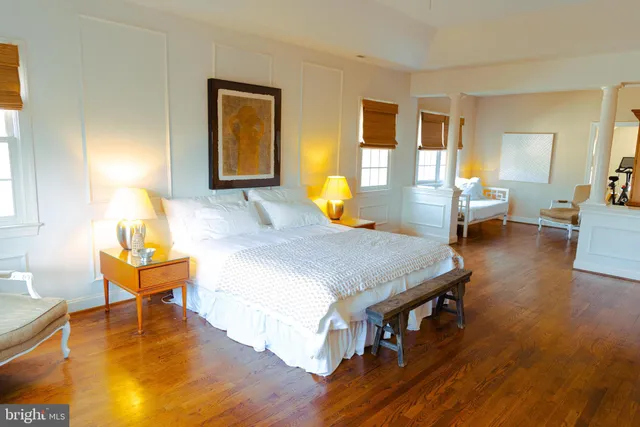 a view of a bathroom with a tub and shower