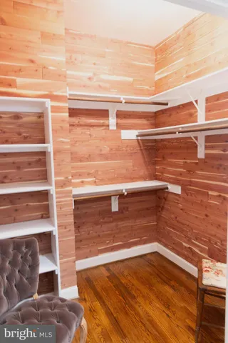 a view of a bedroom with furniture and staircase