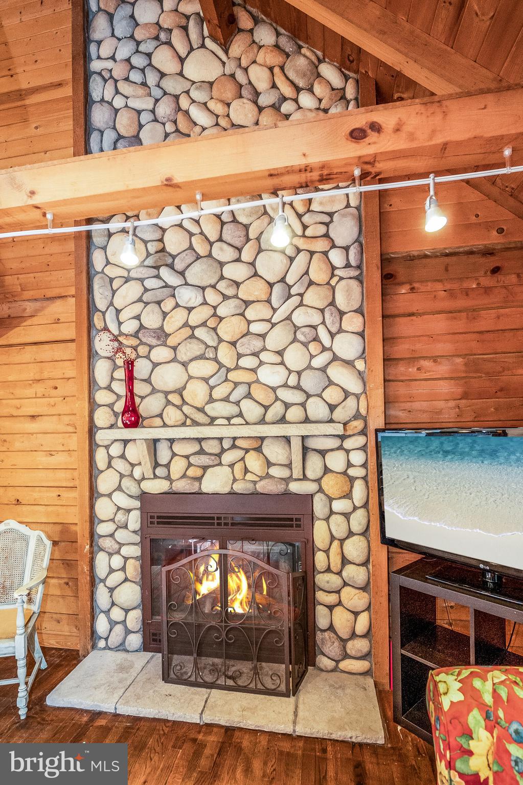 219 Battlefield Road Locust Grove, VA 22508 - Photo 22 of 46 Stunning wood burning fireplace that has been insp