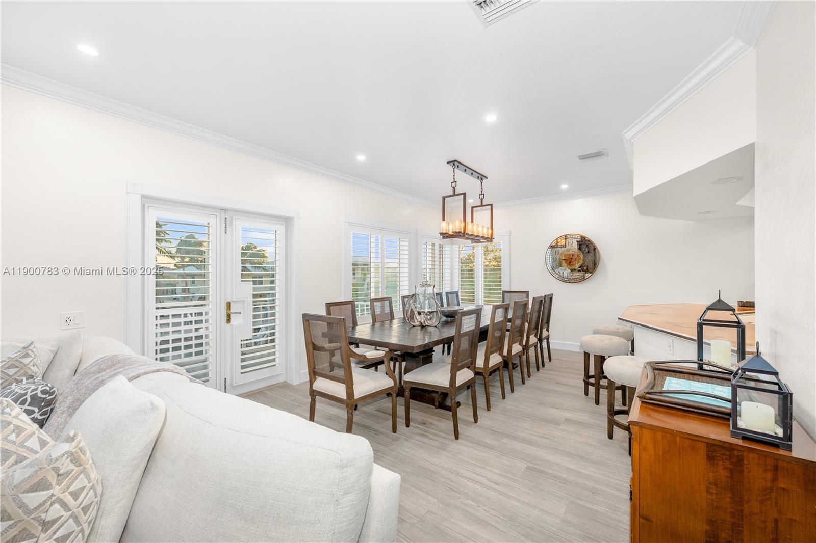 111 Spoonbill Road Tavernier, FL 33070 - Photo 32 of 39 a living room with furniture and wooden floor