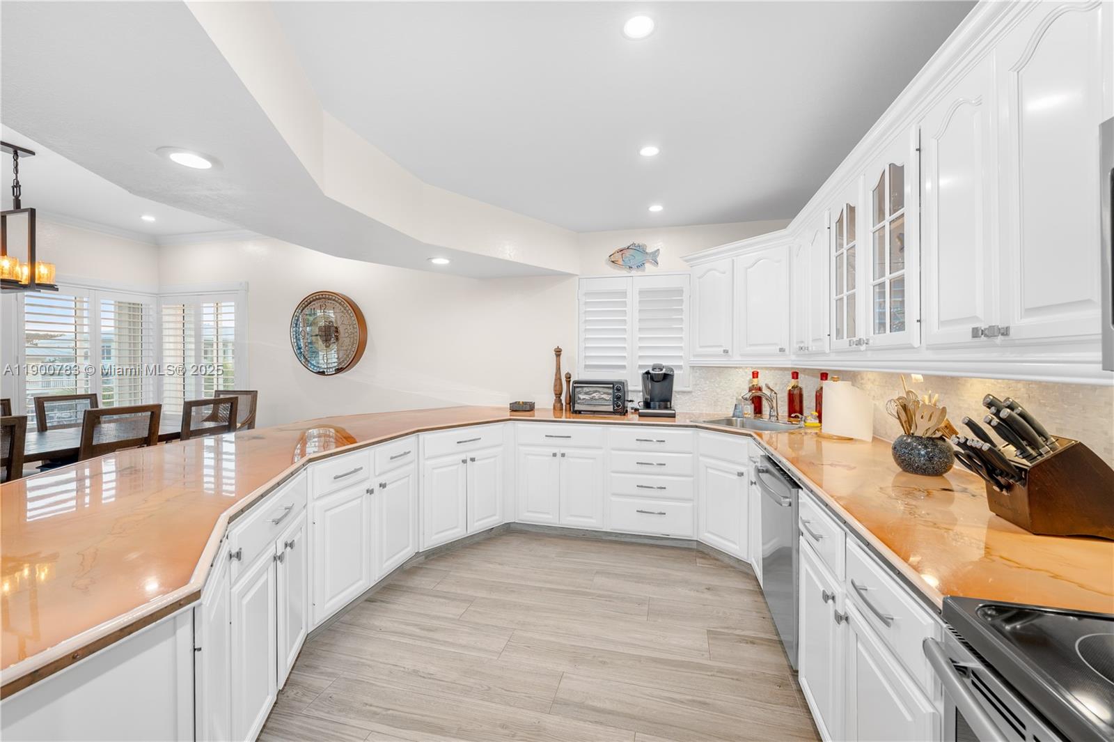 111 Spoonbill Road Tavernier, FL 33070 - Photo 37 of 39 a large white kitchen with a lot of counter space