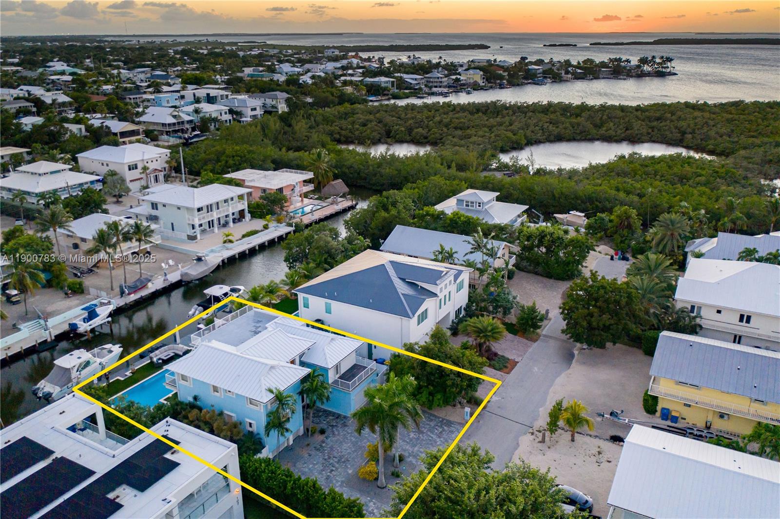 111 Spoonbill Road Tavernier, FL 33070 - Photo 4 of 39 an aerial view of a city with lots of residential buildings ocean and mountain view in back