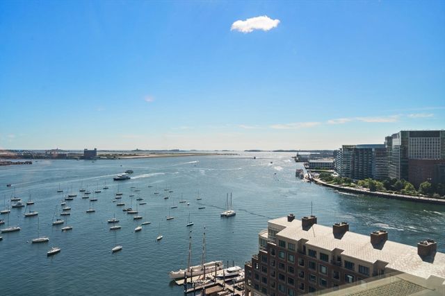 a view of a lake with a city