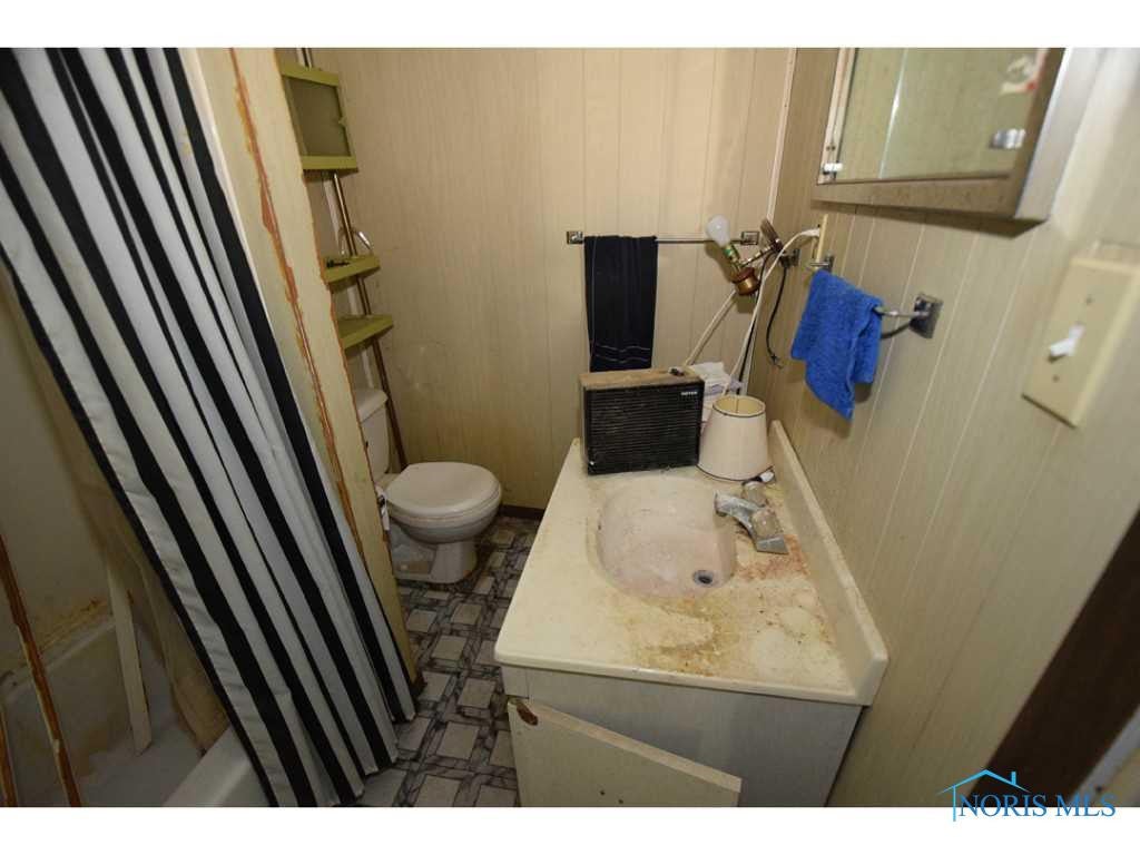 5741 Cedar Point Road Oregon, OH 43616 - Photo 13 of 17 Half Bath.