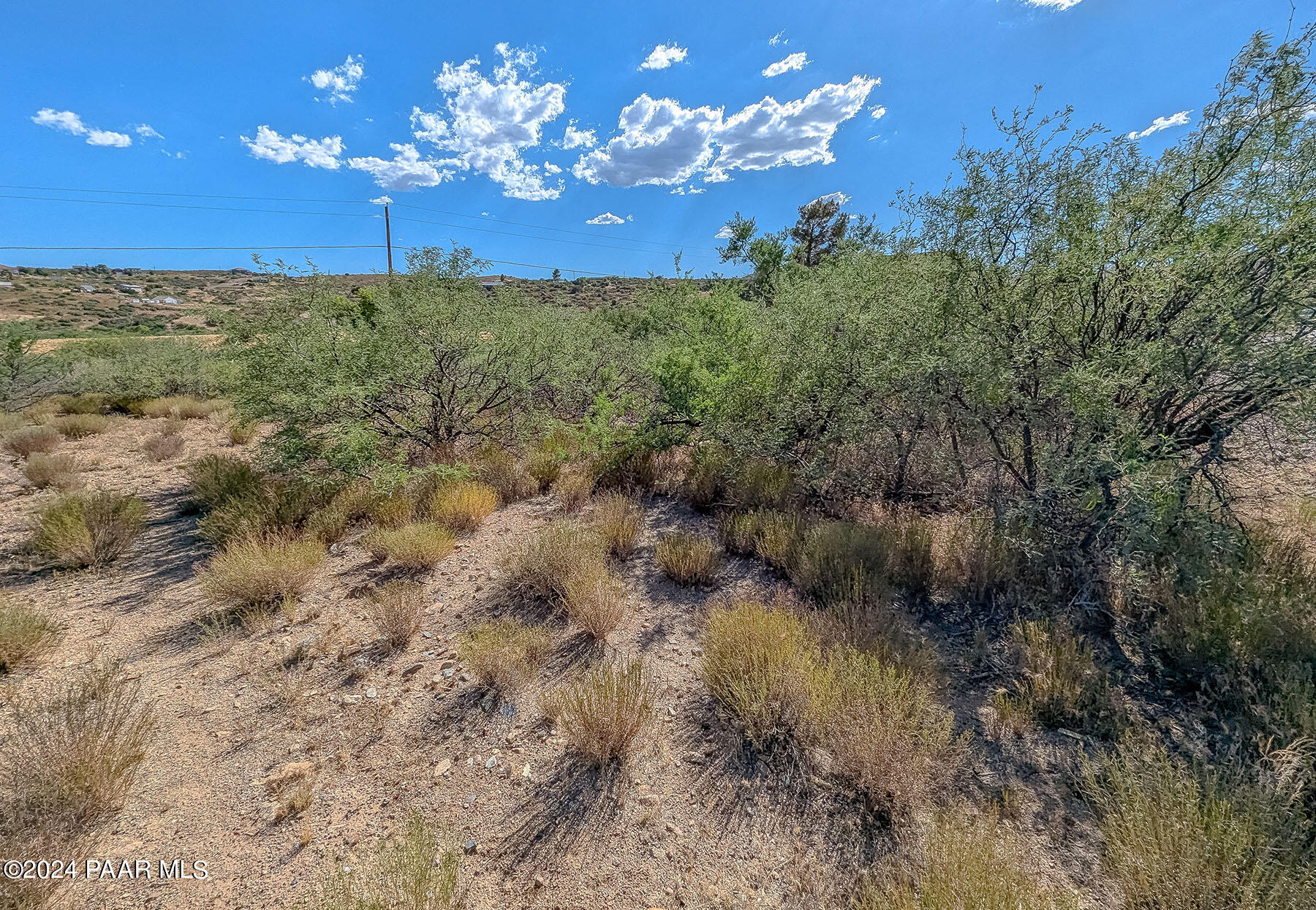 20265 East Lakeside Road Mayer, AZ 86333 - Photo 18 of 20 a view of a house with a yard