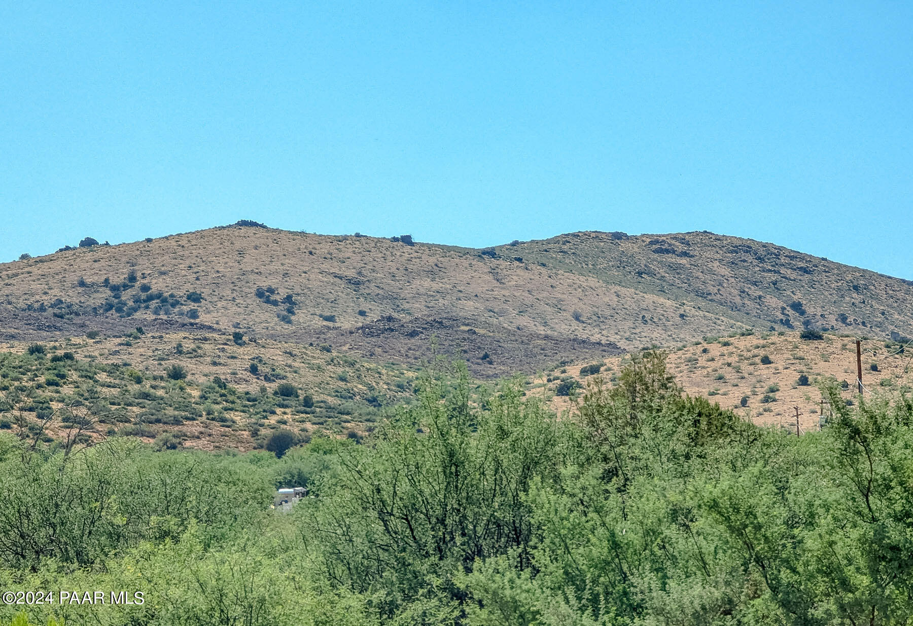 20265 East Lakeside Road Mayer, AZ 86333 - Photo 10 of 20 a view of a mountain range with trees in the background