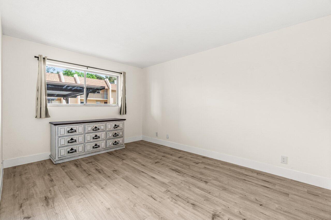 2935 Southwest 22nd Avenue, Unit 1060 Delray Beach, FL 33445 - Photo 15 of 21 wooden floor in a room