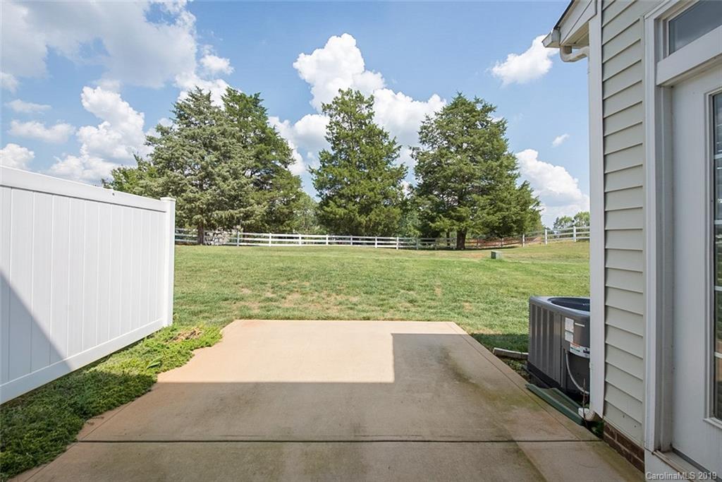 161 Snead Road Fort Mill, SC 29715 - Photo 14 of 14 a view of a swimming pool with a yard