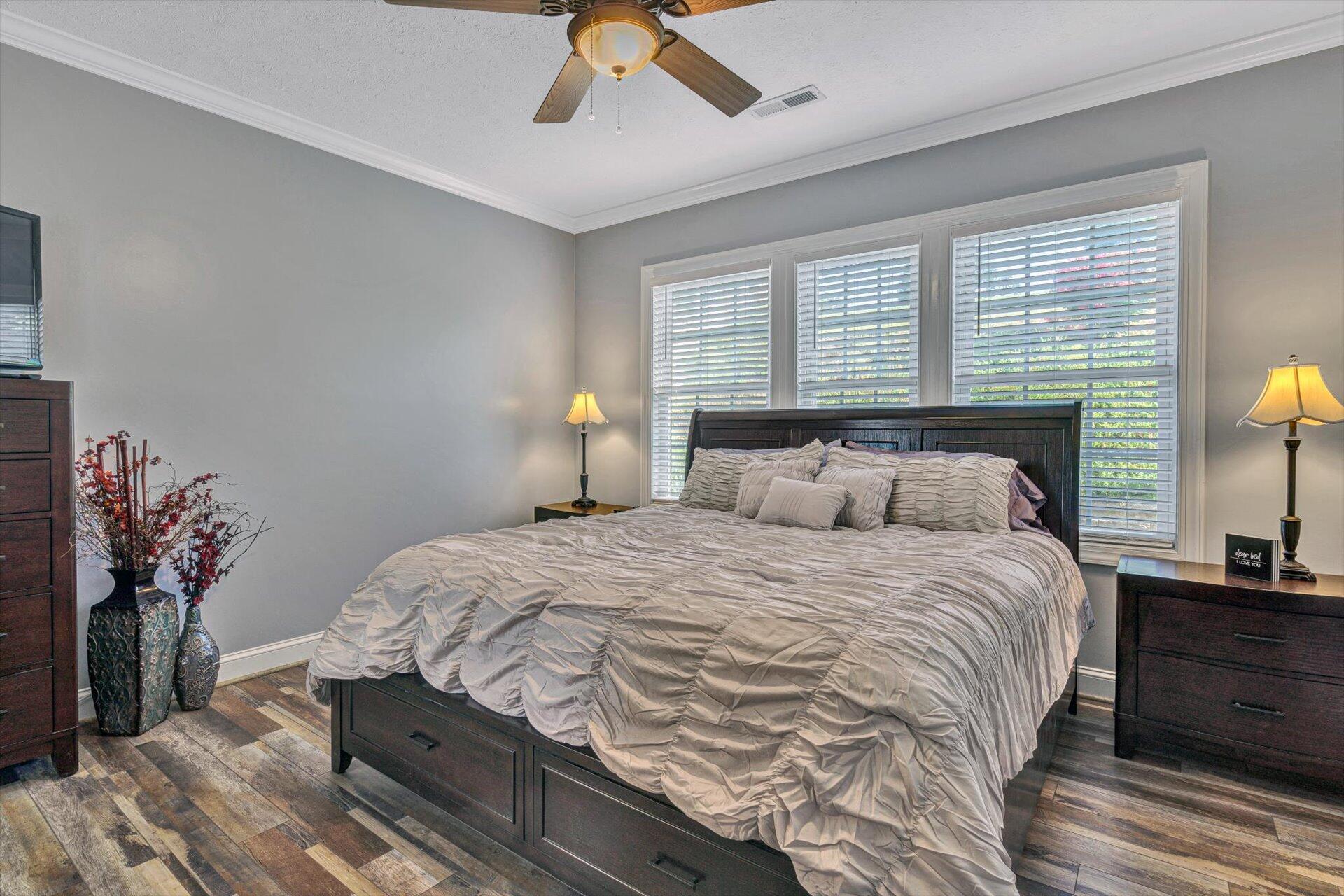 1217 Mountain View Road Vinton, VA 24179 - Photo 21 of 31 a bedroom with a bed and a potted plant