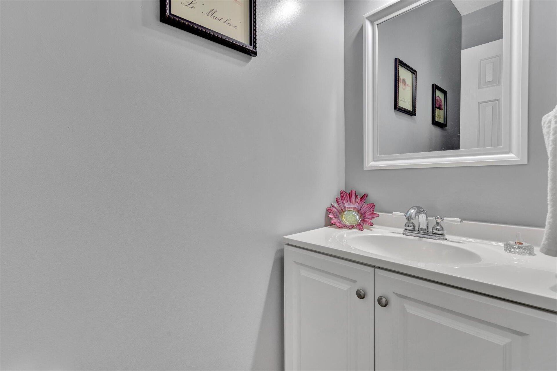 1217 Mountain View Road Vinton, VA 24179 - Photo 25 of 31 a bathroom with a sink vanity and a mirror